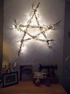 Draped your fairy lights around the star, my fairy lights reached around the star twice. I did try winding the fairy lights around the star but it looked too bulky. Hang on your wall, stand back and admire your handiwork!