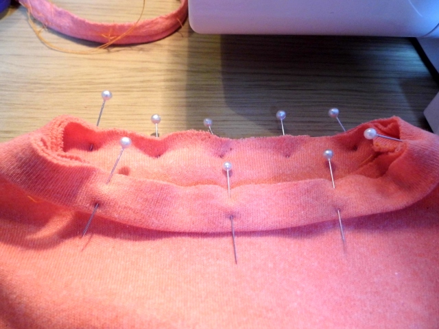 Pin all around the neckband. Sew in a zigzag stitch and turn the neckband out then press well. (I should have taken more photos)